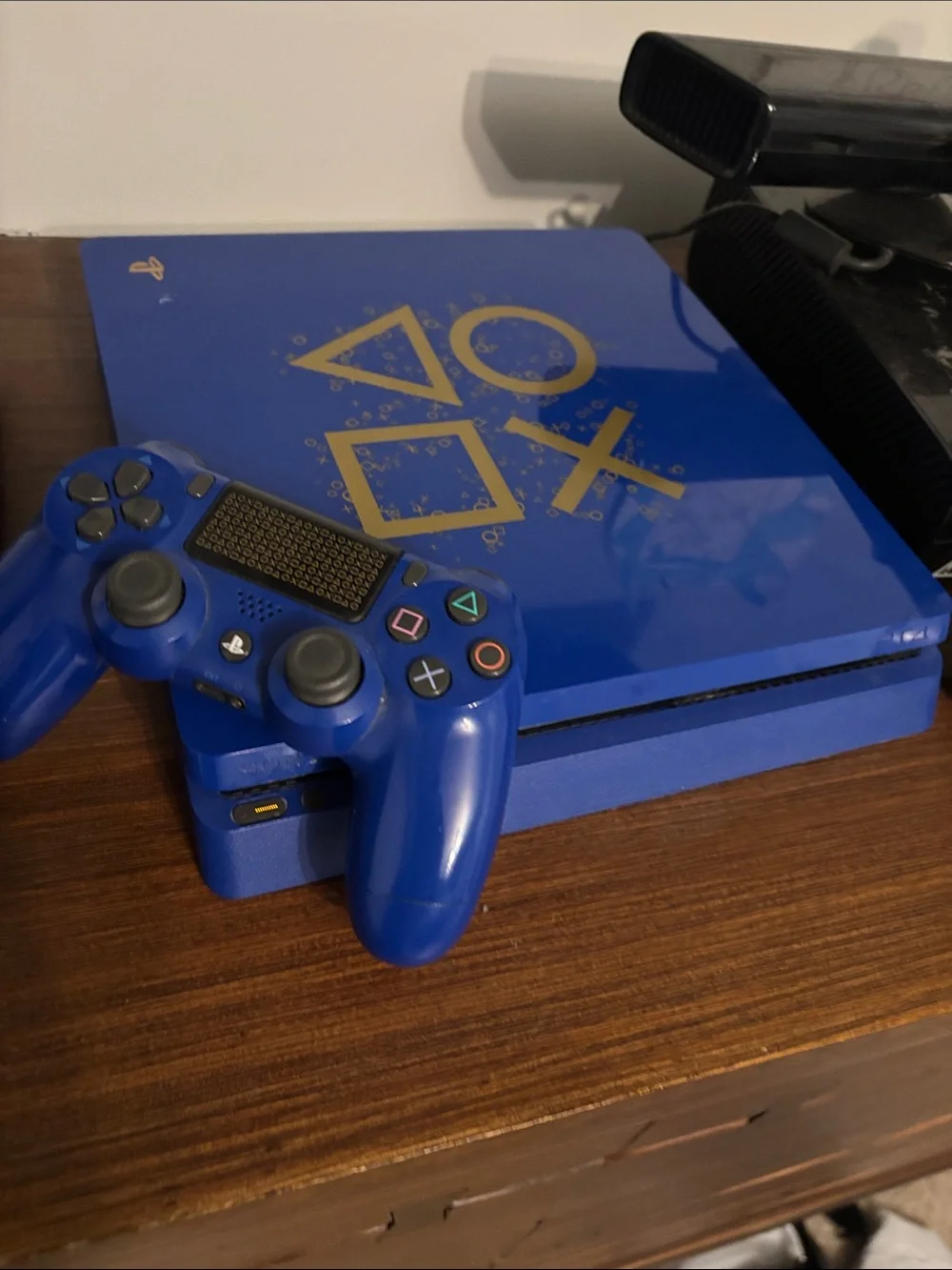 Sony Blue PS4 Slim Console with Gold Icon Accents and Matching Controller